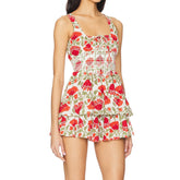 Woman wearing a floral dress with red flowers